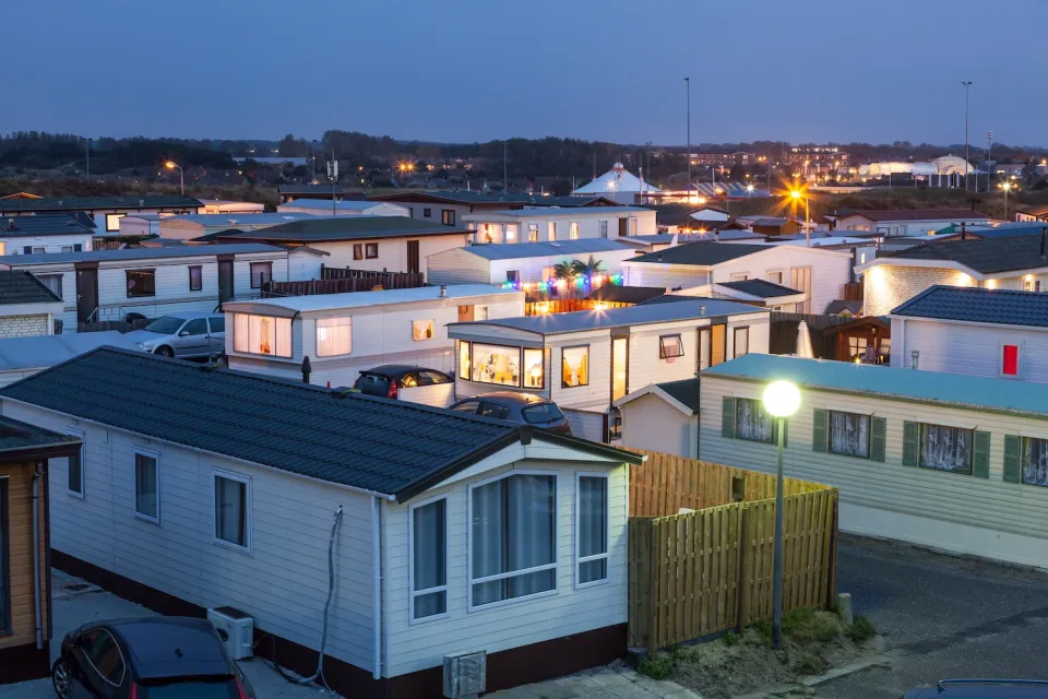 Mobile home park at dusk.